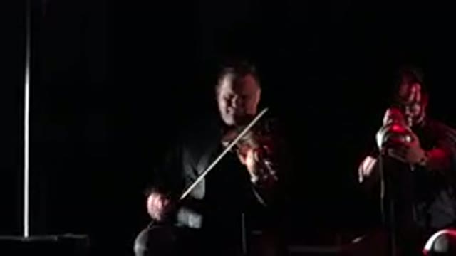 CABO SAN LUCAS MEXICO-2019: Band On Stage Playing A Violin And Something Else