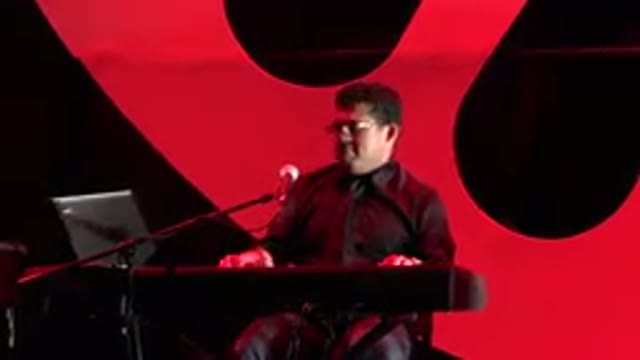 CABO SAN LUCAS MEXICO-2019: Man Wearing Black Shirt And Glasses Plays Keyboard
