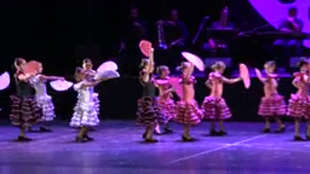 CABO SAN LUCAS MEXICO-2019: Young Women In Wonderful Frilly Dresses Dancing In A