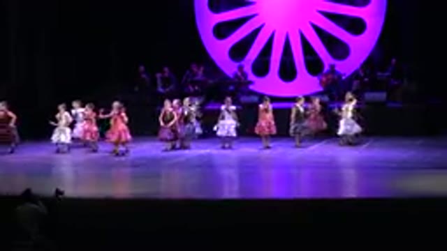 CABO SAN LUCAS MEXICO-2019: A Group Of Girls In Colorful Dresses Are Dancing On Stage