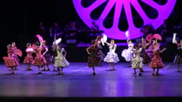 CABO SAN LUCAS MEXICO-2019: Sixteen Little Ladies Joyfully Spins Around And Wave