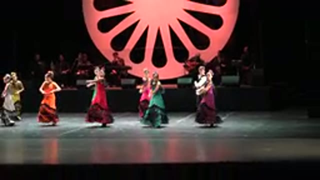 CABO SAN LUCAS MEXICO-2019: Women Wearing Green Orange And Red Dresses Perform