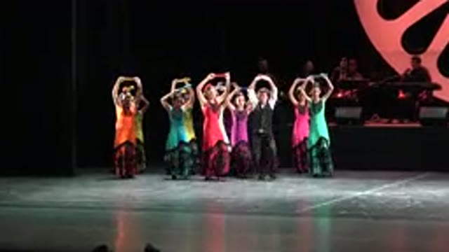 CABO SAN LUCAS MEXICO-2019: People Wearing Green and Red and Black Costumes Performing on Stage