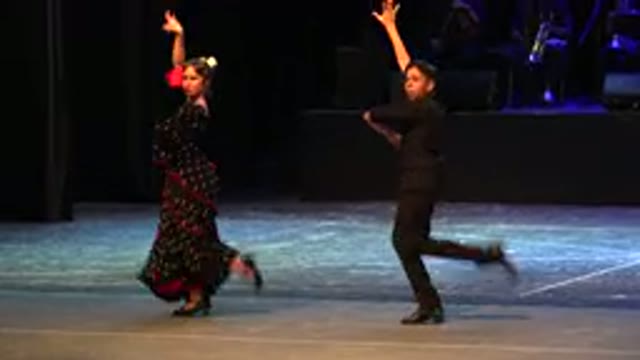 CABO SAN LUCAS MEXICO-2019: Couple Dressed In Black And Red Costumes Perform Flamenco Dance