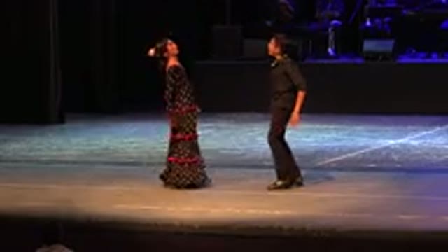 CABO SAN LUCAS MEXICO-2019: A Man And A Woman Circling Each Other In A Seemingly Romantic Dance