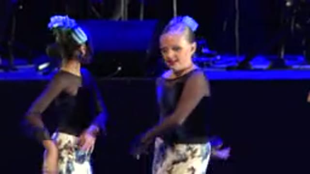 CABO SAN LUCAS MEXICO-2019: Two Girls Dressed In Black And White Perform An Interpretive Dance