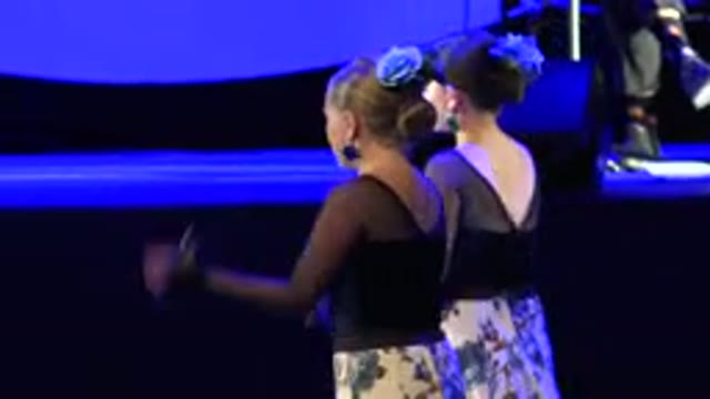 CABO SAN LUCAS MEXICO-2019: Young Girls Dancing Flamenco Wearing Blue Flowers In