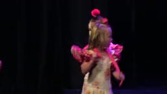 CABO SAN LUCAS MEXICO-2019: Girl Wearing Pink And Yellow Dress Performs Dance On Stage