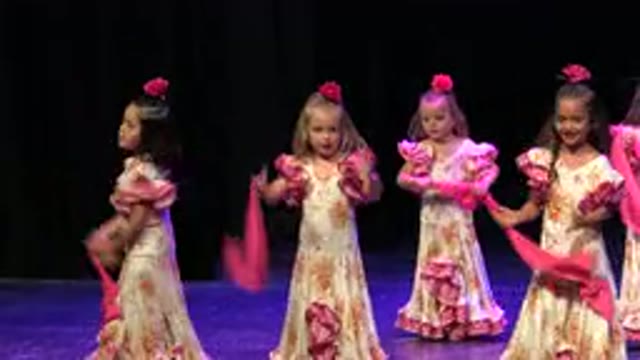 CABO SAN LUCAS MEXICO-2019: A Group of Small Girls Wearing Long Dresses Dancing