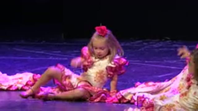 CABO SAN LUCAS MEXICO-2019: Small Girls Sitting On The Floor And Standing Waving