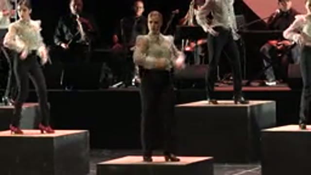 CABO SAN LUCAS MEXICO-2019: Women Wearing Black Pants Dance On Black Cubes On Stage