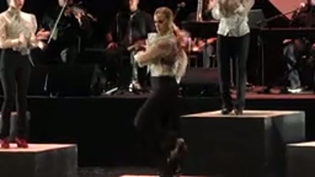 CABO SAN LUCAS MEXICO-2019: A Man Dancing On A Raised Platform On A Stage