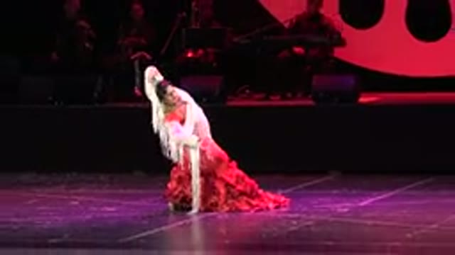 CABO SAN LUCAS MEXICO-2019: Woman On Stage Doing A Dance In A Dress