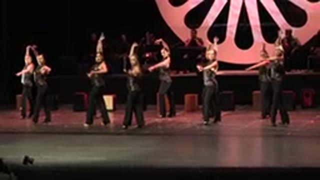 CABO SAN LUCAS MEXICO-2019: Group Of Young People In Black Dancing On Stage