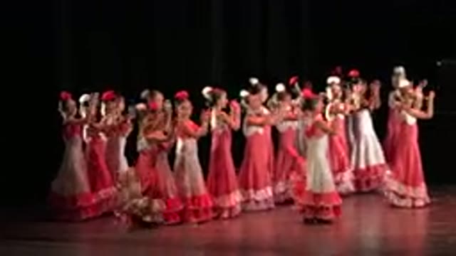 CABO SAN LUCAS MEXICO-2019: Several Girls Dancing Wearing White And Pink Long Dresses With Fringes