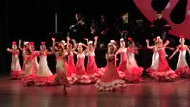 CABO SAN LUCAS MEXICO-2019: A Group Of Little Girls In Pink Dresses Are Performing On Stage