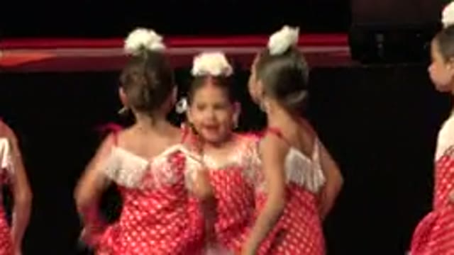 CABO SAN LUCAS MEXICO-2019: Children Dancing On Top Of Stage In Theater With Red Lights