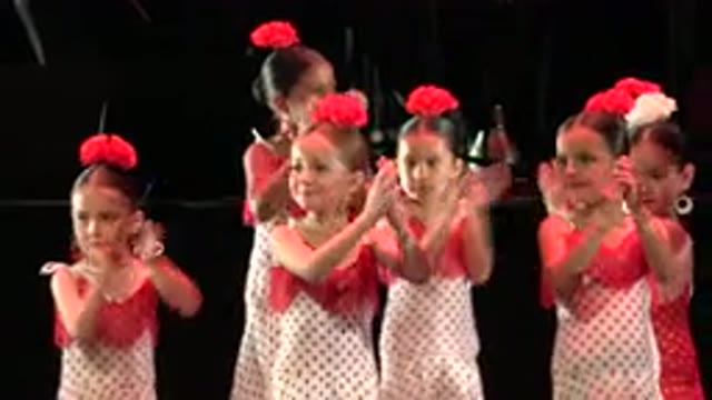 CABO SAN LUCAS MEXICO-2019: Young Flamenco Girls With Red And White Flowers In