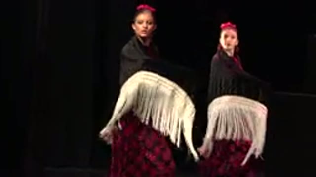 CABO SAN LUCAS MEXICO-2019: Two Women In Black Dress Are Dancing On Stage In