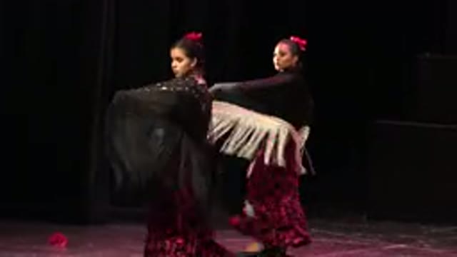 CABO SAN LUCAS MEXICO-2019: Women In Formal Dresses Are Dancing In Front Of An