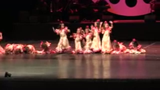 CABO SAN LUCAS MEXICO-2019: Young Girls in Dresses Waving at Dance Recital