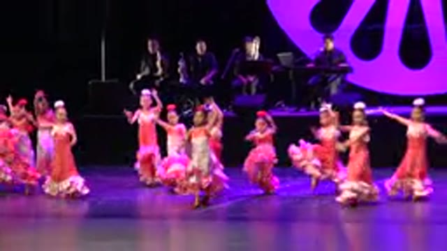 CABO SAN LUCAS MEXICO-2019: Young Girls In Fun Frilly Red And White Gowns With