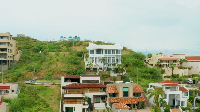 SAN JOSE DEL CABO BCS MEXICO-2021: Hillside Residential Area with Transforming Modern Building