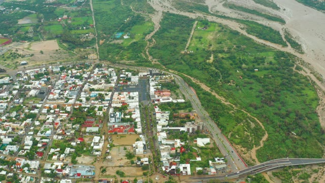 SAN JOSE DEL CABO BCS MEXICO-2021: Floodwater Receding From Town's Riverbank
