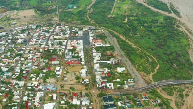 SAN JOSE DEL CABO BCS MEXICO-2021: Town and Receding River From Aerial View