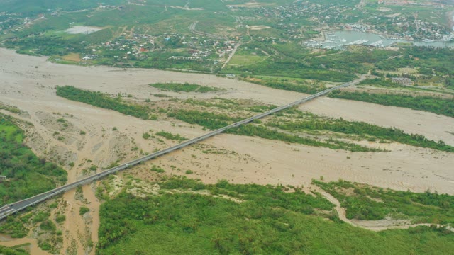 SAN JOSE DEL CABO BCS MEXICO-2021: Long Bridge Spanning Muddy River From Above