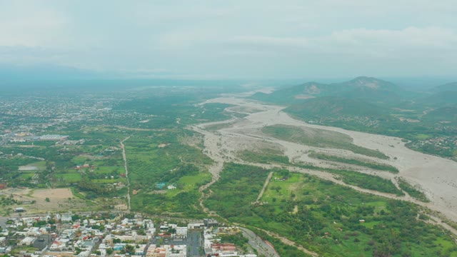 SAN JOSE DEL CABO BCS MEXICO-2021: River Winding Through Green Fields and Town