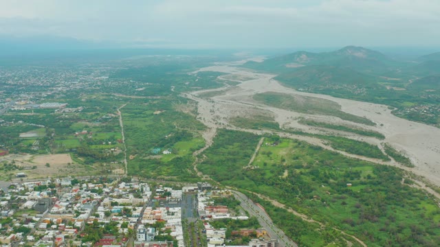 SAN JOSE DEL CABO BCS MEXICO-2021: River Winding Through Rural Town and Green Fields