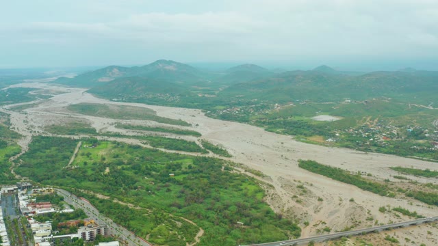 SAN JOSE DEL CABO BCS MEXICO-2021: Muddy River Flowing Through Lush Valley