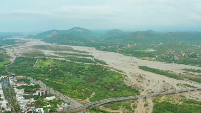 SAN JOSE DEL CABO BCS MEXICO-2021: Receding River Exposing Riverbed and Bridge