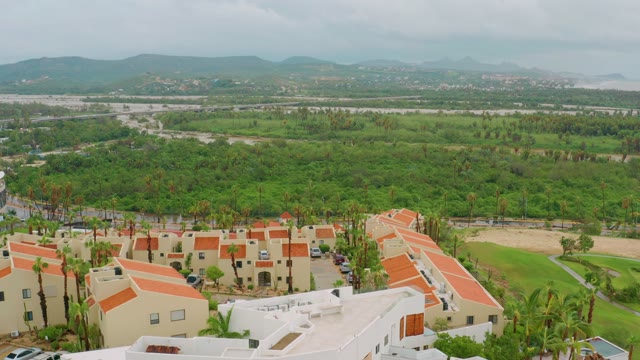 SAN JOSE DEL CABO BCS MEXICO-2021: Residential Complex with Terracotta Roofs and Green Landscape