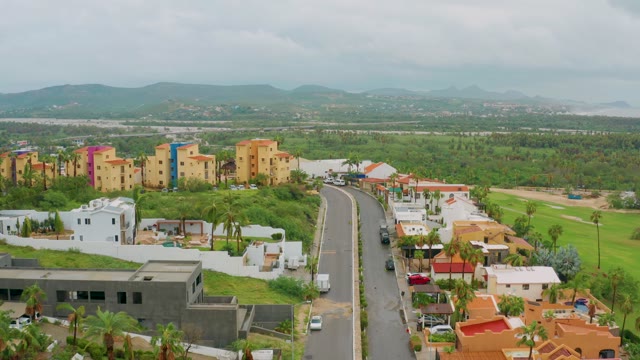 SAN JOSE DEL CABO BCS MEXICO-2021: Road with Moving Van and Residential Buildings