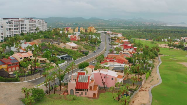 SAN JOSE DEL CABO BCS MEXICO-2021: Residential Neighborhood with Golf Course and Curved Road