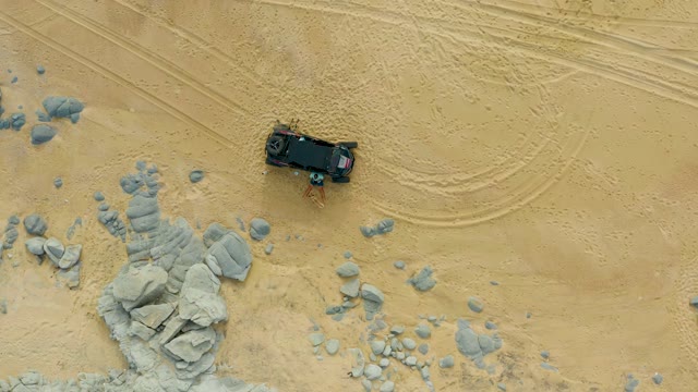 LAGUNA BEACH LOS CABOS BCS MEXICO-2021: Truck Moving on Sandy Terrain with Scattered Rocks