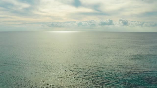 LAGUNA BEACH LOS CABOS BCS MEXICO-2021: Sunlight Glinting on Calm Ocean Surface