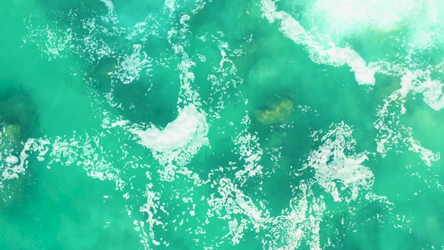LAGUNA BEACH LOS CABOS BCS MEXICO-2021: Overhead View of Turquoise Ocean Waves and White Foam