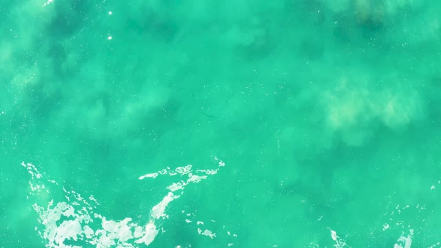 LAGUNA BEACH LOS CABOS BCS MEXICO-2021: Gentle Ocean Waves in Clear Turquoise Water