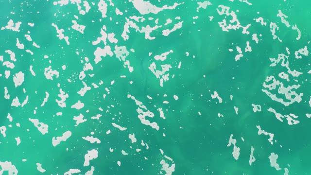 LAGUNA BEACH LOS CABOS BCS MEXICO-2021: Shallow Turquoise Water with Moving White Foam Patches