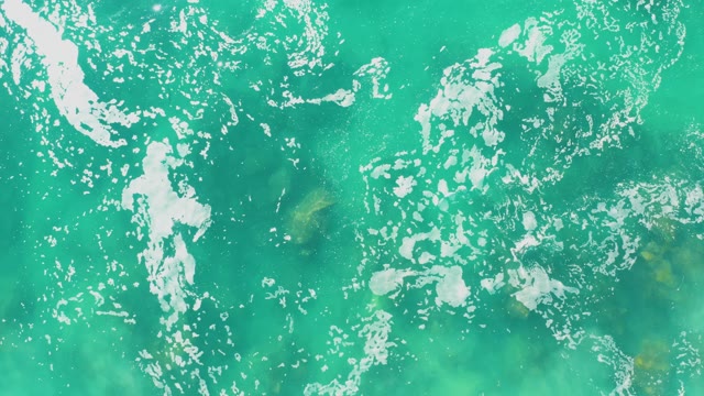 LAGUNA BEACH LOS CABOS BCS MEXICO-2021: Turquoise Water with Foamy Surface and Submerged Rocks