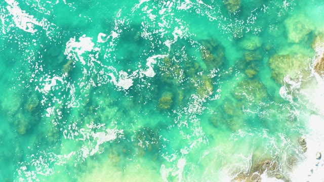 LAGUNA BEACH LOS CABOS BCS MEXICO-2021: Turquoise Waves Crashing Over Rocky Seabed