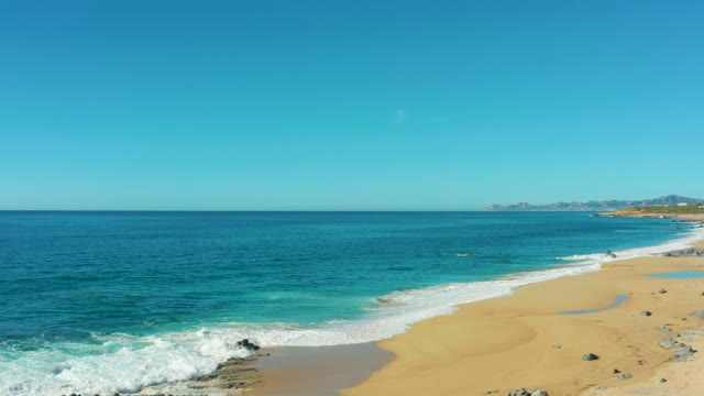 LAGUNA BEACH LOS CABOS BCS MEXICO-2021: Sandy Beach with Turquoise Ocean Waves