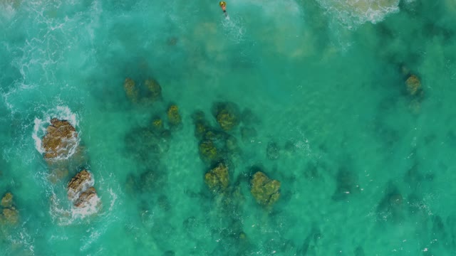 LAGUNA BEACH LOS CABOS BCS MEXICO-2021: Turquoise Ocean Water with Submerged Rocks and Gentle Waves
