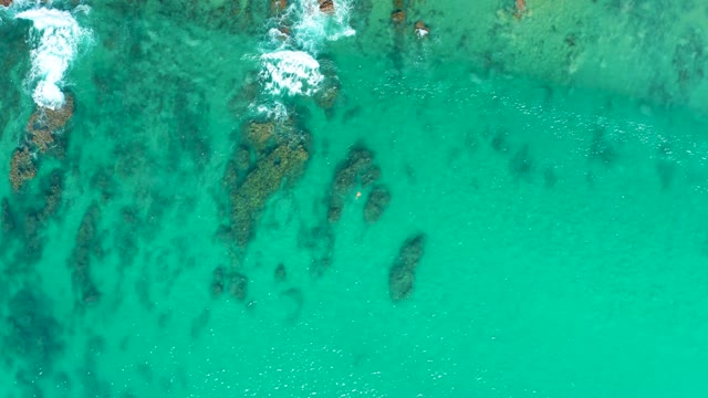 LAGUNA BEACH LOS CABOS BCS MEXICO-2021: Gentle Ocean Waves Over Rocky Seabed