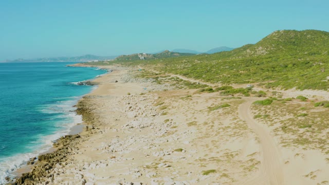 LAGUNA BEACH LOS CABOS BCS MEXICO-2021: Sandy Coastline with Turquoise Ocean and Hillside Path