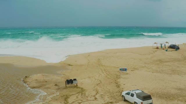 DREAMS RESORT LOS CABOS BCS MEXICO-2021: Sandy Beach with Ocean Waves and Moving Vehicle