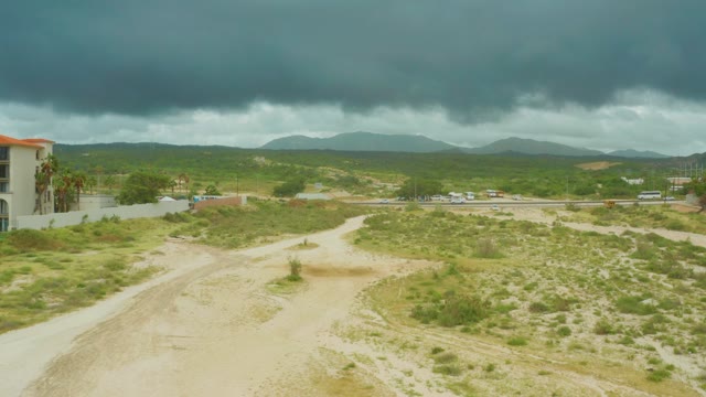 DREAMS RESORT LOS CABOS BCS MEXICO-2021: Stormy Sky Over Arid Field and Dirt Path
